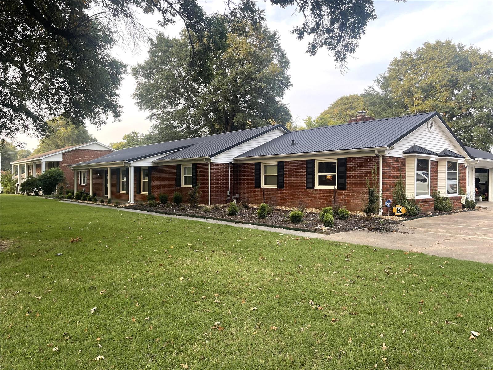 & SE MO Homes & Real Estate American Elite Realty